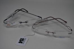 Two pairs of as new Airlight glasses frames with clear glass (RRP £180 each).