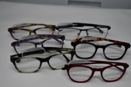 Six pairs of as new glasses frames with clear glass to include Charles Stone and Serge Blanco (