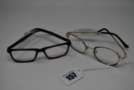 Two pairs of as new Dutz glasses frames with clear glass (RRP £190 each).