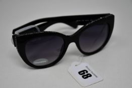 A pair of as new Swarovski sunglasses (RRP £120).
