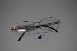 A pair of as new Airlight glasses frames with clear glass (RRP £220).