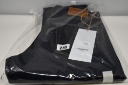 A pair of as new Blackhorse Lane Ateliers E8 relaxed slim tapered indigo jeans (30 - RRP £200).