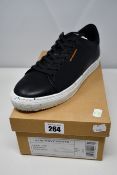 A pair of as new New Movements Huk trainers in black fleck (UK 10).