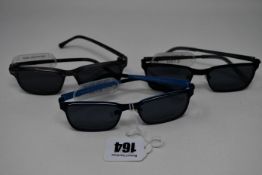 Three pairs of as new Convertibles glass frames with clear glass with magnetic sunglasses attachment
