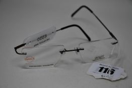 A pair of as new Airlight glasses frames with clear glass (RRP £220).