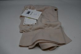 One lady's Khaite Polo wool sweater in pale pink (M).