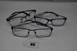 Three pairs of as new glasses frames with clear glass; TitanFlex and Brendel (RRP £160 each).