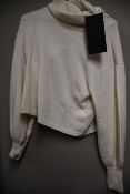 An as new The Kooples fancy turtle neck mix sweater (Size 1 - RRP €228).