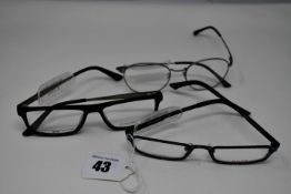 Three pairs of as new glasses frames with clear glass; Dutz, P+US and Convertibles (RRP £150 each).
