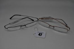 Two pairs of as new air Pro-Optic glasses frames with clear glass (RRP £150 each).