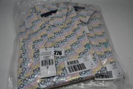 Two Ralph Lauren Polo X Asos exclusive collab shirts in white with all over logo (Both M).