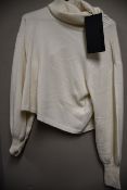 An as new The Kooples fancy turtle neck mix sweater (Size 2 - RRP €228).