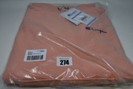 Two as new Champion relaxed hoodies with chest logo in light pink (Both M).