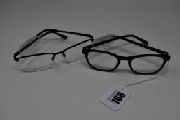 Two pairs of as new Dutz glasses frames with clear glass (RRP £190 each).