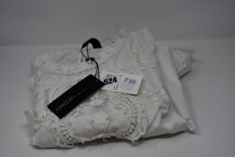 Two Marc Cain collection blouses (Size N4 and N5?).