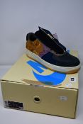 A pair of as new Nike Air Force 1 Low Travis Scott Cactus Jack trainers (UK 12).