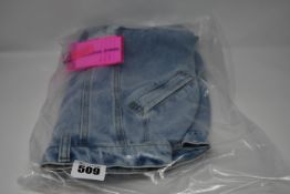 An as new Natasha Zinko denim mini skirt (Size 36 - RRP £336).