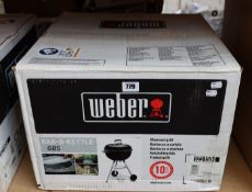 One boxed as new Weber Bar-B-Kettle in black (GBS).