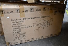 A boxed as new 4-piece Rattan garden sofa and table set in grey.