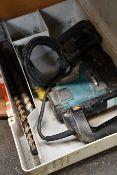 A pre-owned Makita HR4000C SDS-Max rotary demolition hammer drill.