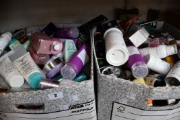 Two boxes of as new/pre-owned toiletries.