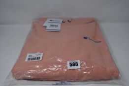 Two as new Champion relaxed hoodies with chest logo in light pink (Both L).