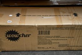 One boxed as new Rattan four piece garden furniture set.