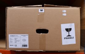 A boxed as new Oskar Store granite round sink with drainer in grey.