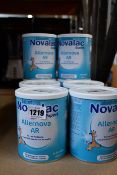 Twelve cans of Novalac Expert Allernova AR (400g).