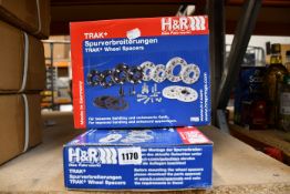 Two boxed as new Trak plus wheel spacers.