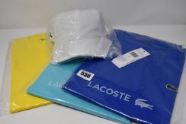 Three as new Lacoste t-shirts (US S, L, XL) and a Lacoste baseball cap.