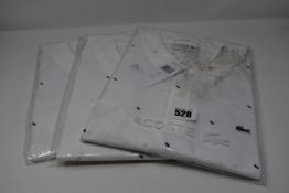 Three as new Lacoste white polo shirts with blue decoration (US M, L, XL).
