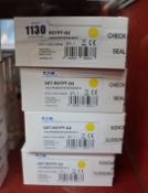 Ten boxed as new Eaton dual PIR/uWave pet motion radios (DET-RDTPT-G2 space protection).