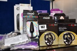 A Doc Johnson Sasha Grey vibrating deep throat sucker, a Doc Johnson mood pleasure thick ribs male