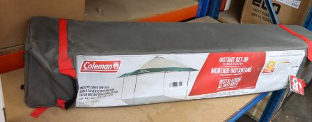 One as new Coleman Instant Eaved Shelter (4m x 4m).