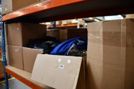 Four boxes of assorted clothes and related items and a box of bags/purses/wallets.