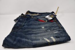 A pair of as new Ralph Lauren Classic jeans (36 - RRP £150).
