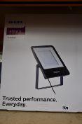 A boxed as new Philips Ledinaire LED Floodlight 200w IP65 Asymmetric Beam Cool White (11401733322).