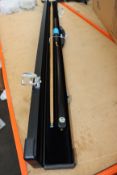 One as new Peradon three piece snooker cue with case.