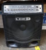 An as new unboxed Low Down Line 6 guitar amplifier (Slight damage to mesh speaker cover).