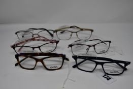 Four pairs of as new Oxibis glasses frames with clear glass (RRP £230 each).