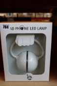 Four boxed as new New York Gift Co. Rechargeable LED Headphone Shaped Lamps (Model: NY01).
