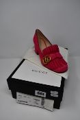 A pair of as new Gucci Kid Scamosciato shoes in hot pink (EU 37).