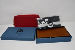 Three ladies as new purses to include Fossil, Prime Hide and Angel Firenze.