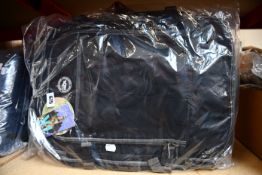 Five as new Cabin Max expandable cabin backpacks in black.