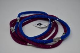 Three as new Swarovski cerise Stardust (M) wrap round bracelets and two Royal blue Swarovski wrap