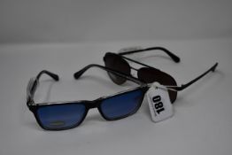 Two pairs of as new Guess sunglasses (RRP £80 and £90).