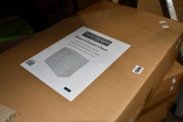 Three boxed as new Vida Designs Riano four drawer chests (Two white, one black).