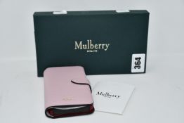 An as new Mulberry iPhone flip case in powder pink (RRP £195).