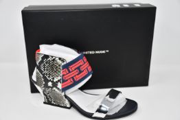 A pair of as new United Nude Raiko sandals (EU 39 - RRP £150).
